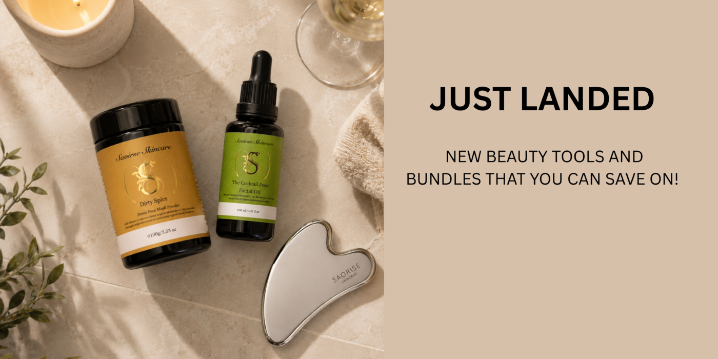 Promo banner for new beauty tools and bundles featuring Saorise skincare bottles on a light marble surface with a beige right panel showing the 'JUST LANDED' headline.