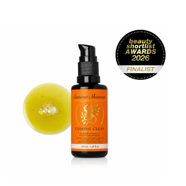 Facial cleansing oil bottle with an orange label beside a round yellow soap, plus a Beauty Shortlist Awards 2026 Finalist badge in the corner.