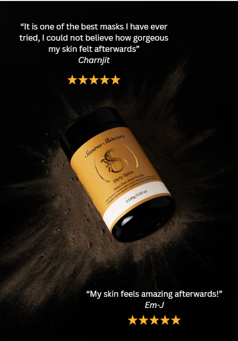 Skincare bottle labeled ‘Dirty Spice’ on a dark powdery surface, with gold stars and two quotes praising the product above and below.